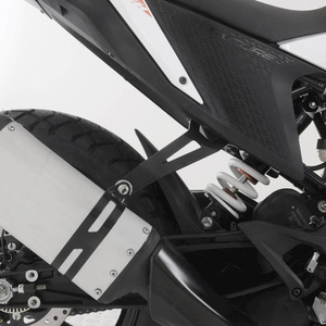 Mocowanie motocyklowe wydechu + zaślepka podnóżka RG Racing KTM 390 Adventure 20- czarne